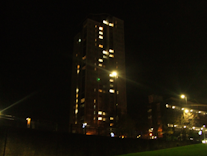 An apartment block in the night